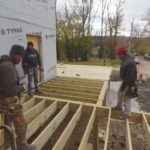men building a deck